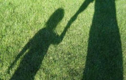 shadow woman and child